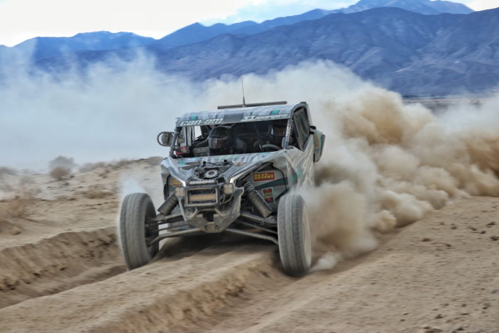 ITP pilot Dustin Jones (Can-Am, S3 Racing, ITP Tires) hammers the throttle through a thick dust section